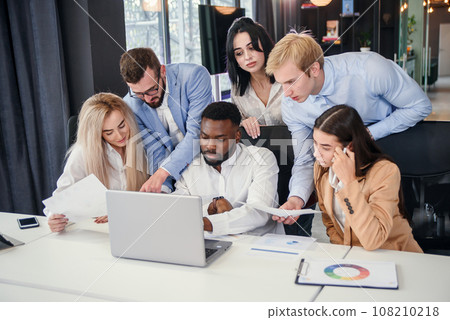International multiethnic teamworkers are being discussing their bussines in office 108210218