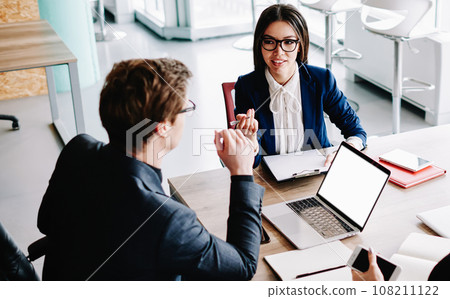 group of skilled business partners discussing statement for project share creative ideas in office group of skilled business partners discussing statement for project share creative ideas in office 108211122