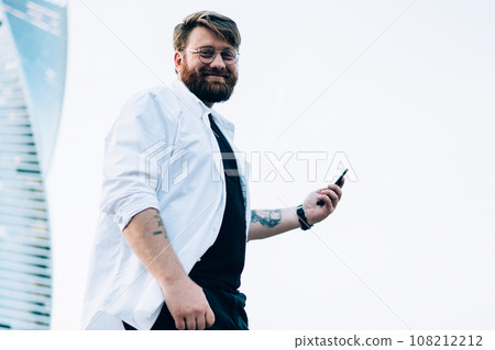 Half length portrait of positive male generation looking at camera 108212212