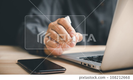 Businessman using digital device signs electronic documents online. Embracing digital transformation, represents efficiency of e-signing, digital document management. Agreement is finalized. Businessman using digital device signs electronic documents online. Embracing digital transformation, represents efficiency of e-signing, digital document management. Agreement is finalized. 108212668