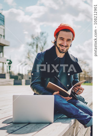 positive hipster guy with notepad positive hipster guy with notepad 108212901