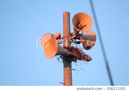 Disaster prevention radio speaker at sunrise Disaster prevention radio speaker at sunrise 108213281