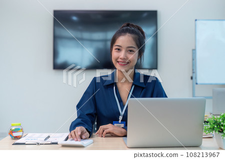 Accountant woman audit and calculate with financial paperwork at office Accountant woman audit and calculate with financial paperwork at office 108213967