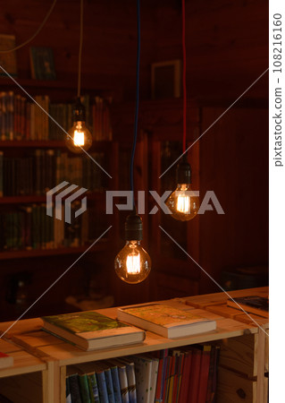 Image of a used bookstore, bookstore, or library with a warm atmosphere Image of a used bookstore, bookstore, or library with a warm atmosphere 108216160