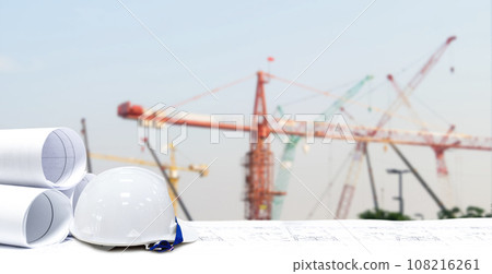 Engineer's helmet and construction plans. Concept. Engineer's helmet and construction plans. Concept. 108216261