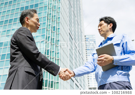 Business work clothes real estate handshake Business work clothes real estate handshake 108216988