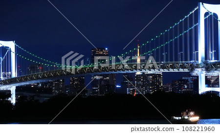Rainbow Bridge and Tokyo Tower illuminated in green Rainbow Bridge and Tokyo Tower illuminated in green 108221960