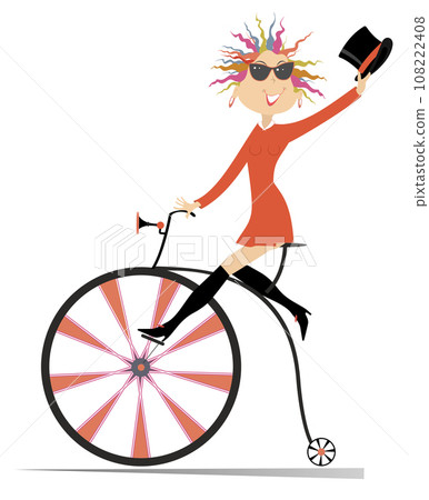 Young woman rides on a vintage bike. Sexy young woman with a top hat riding on a penny-farthing. Isolated on white background 108222408