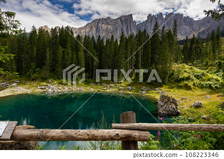 Landscape of Lake Carezza or Karersee and Dolomites in background, Nova Levante, Italy 108223346