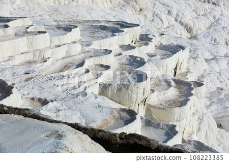 Travertines mountains of Pamukkale in Turkey. Travertines mountains of Pamukkale in Turkey. 108223385