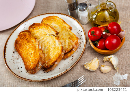 Ingredients for traditional Spanish appetizer Pa amb tomaquet 108223451