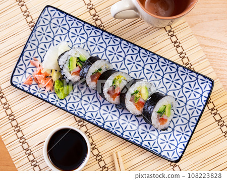 Japanese roll futomaki with soy sauces Japanese roll futomaki with soy sauces 108223828