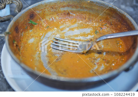 Empty plate after eating on table  108224419