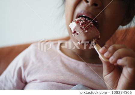 Child Hand Holding Ice Cream Child Hand Holding Ice Cream 108224506