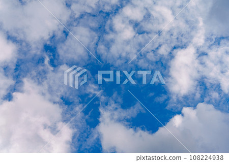 Blue Sky with Lots of White Clouds: Background for Replacement or Inspiring Ideas 108224938