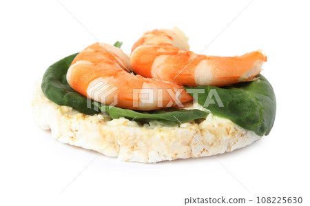 Puffed rice cake with shrimps and basil isolated on white Puffed rice cake with shrimps and basil isolated on white 108225630