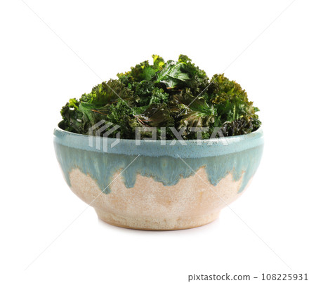 Tasty baked kale chips isolated on white Tasty baked kale chips isolated on white 108225931