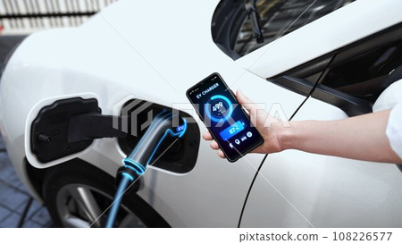 Smartphone display battery status interface by smart EV app. Peruse 108226577