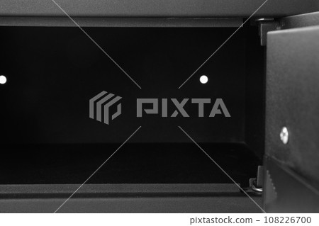 Modern open empty black steel safe, closeup 108226700