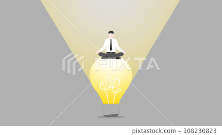 A businessman sits on a big light bulb. A businessman sits on a big light bulb. 108230823