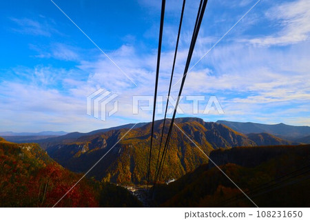 Blazing autumn, Hokkaido in brocade autumn, October, autumn leaves in Sounkyo, Mt. Kurodake ropeway, Mt. Kurodake climbed by ropeway, red-yellow autumn leaves Blazing autumn, Hokkaido in brocade autumn, October, autumn leaves in Sounkyo, Mt. Kurodake ropeway, Mt. Kurodake climbed by ropeway, red-yellow autumn leaves 108231650