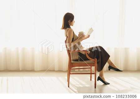 A woman reading 108233006
