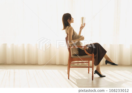 A woman reading 108233012