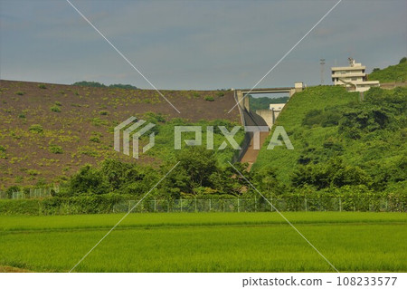 Nanakita Dam embankment and downstream countryside Nanakita Dam embankment and downstream countryside 108233577