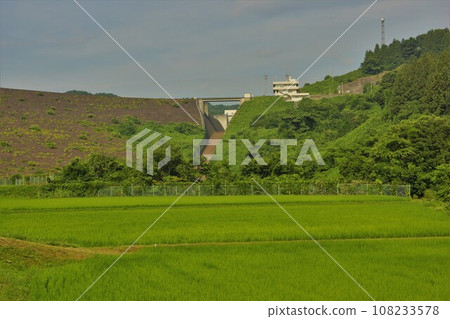 Nanakita Dam embankment and downstream countryside Nanakita Dam embankment and downstream countryside 108233578