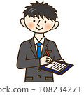 A man in a suit writing documents 108234271