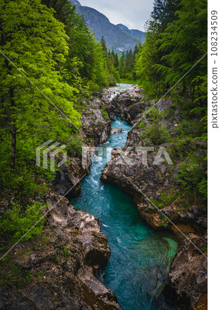 Turquoise Soca river in the narrow gorge, Bovec, Slovenia Turquoise Soca river in the narrow gorge, Bovec, Slovenia 108234509