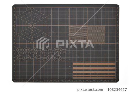 brown cutting mat isolated on white background, equipment in office 108234657