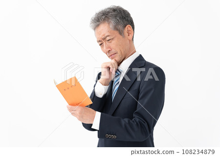 Businessman senior with pension notebook 108234879