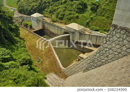 Downstream water discharge seen from the top of Miharu Dam Downstream water discharge seen from the top of Miharu Dam 108234990