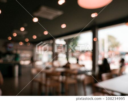 Blurred images of the coffee shop cafe interior background and lighting bokeh 108234995