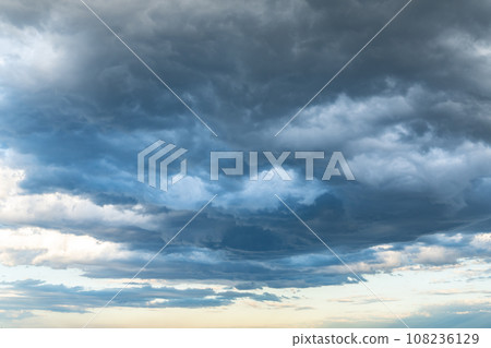 Sky background where rain clouds begin to cover d-1 108236129