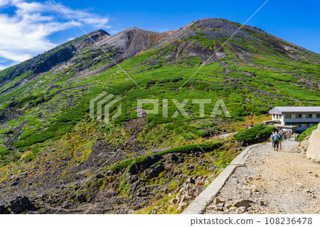 Sightseeing climbing of Mt. Norikura in Nagano Prefecture: Kengamine seen from the promenade near Shoulda no Koya Sightseeing climbing of Mt. Norikura in Nagano Prefecture: Kengamine seen from the promenade near Shoulda no Koya 108236478