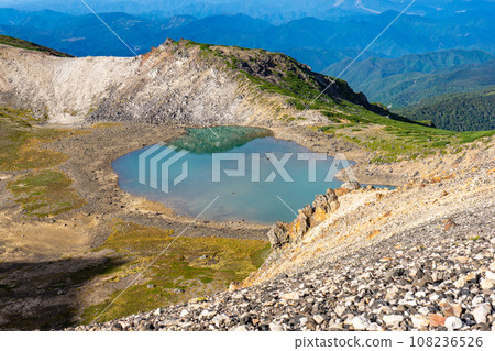 Sightseeing climbing of Mt. Norikura in Nagano Prefecture, Gongen Pond (crater ruins) 108236526