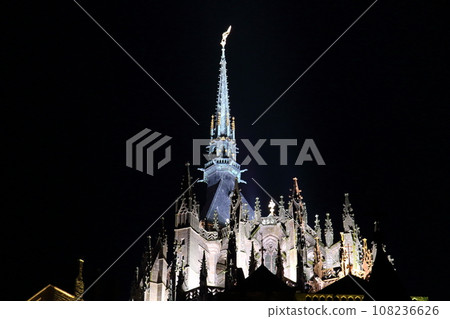 Night view of the abbey Mont Saint-Michel, a world cultural heritage site, built on a small island in Saint-Malo Bay in the Normandy region of France 108236626