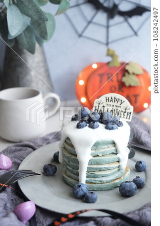 Halloween tea time with blue pancakes Halloween tea time with blue pancakes 108242497