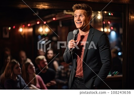 Standup Show, Young Comedian Performing his Stand-Up Monologue, Caucasian Male on a Night Club Stage Standup Show, Young Comedian Performing his Stand-Up Monologue, Caucasian Male on a Night Club Stage 108243636