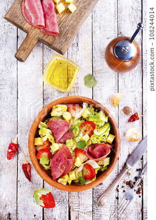 Iberian Ham, Strawberries and vegetables. Restaurant menu, dieting, cookbook recipe top view. Iberian Ham, Strawberries and vegetables. Restaurant menu, dieting, cookbook recipe top view. 108244014
