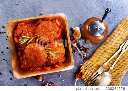 hot meatballs with tomato sauce and basil close-up. top view 108244556