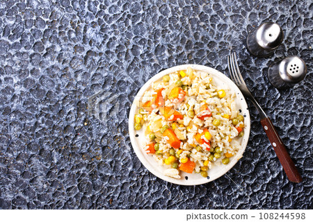 salad with bulgur, parsley and vegetables, top view 108244598