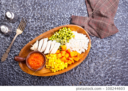 lunch box with rice, carrot, corn and chicken meat 108244603