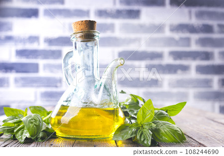 Organic sunflower oil with fresh basil Organic sunflower oil with fresh basil 108244690