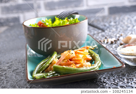 salad with shrimp and green beans on plate 108245134