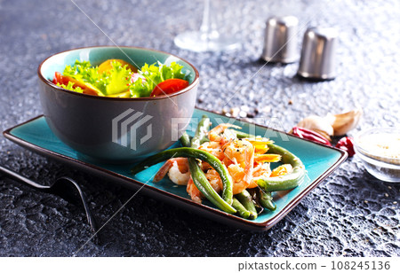 salad with shrimp and green beans on plate 108245136