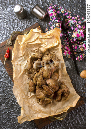 Fried chicken liver with onions and herbs. Fried chicken liver with onions and herbs. 108245177
