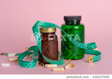 Weight Loss Pills and Measuring Tape, Diet Supplements Capsules, Obesity Lose Tablets, Color Drugs Pile 108247040